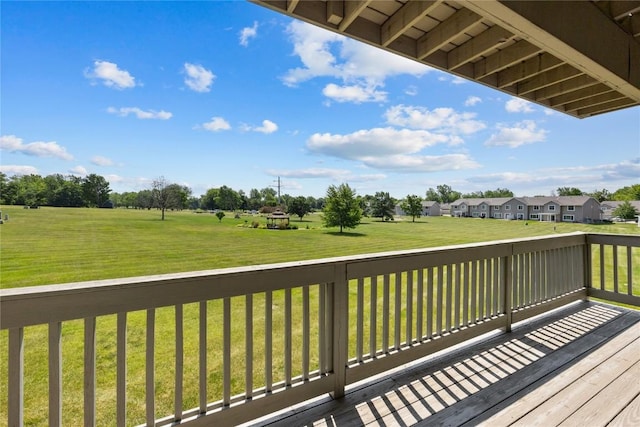 250 Cimarron Dr NE, Hiawatha, IA 52233 - wooden terrace with a yard and a residential view