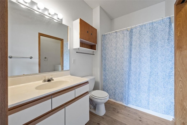 250 Cimarron Dr NE, Hiawatha, IA 52233 - full bath with wood finished floors, vanity, and curtained shower