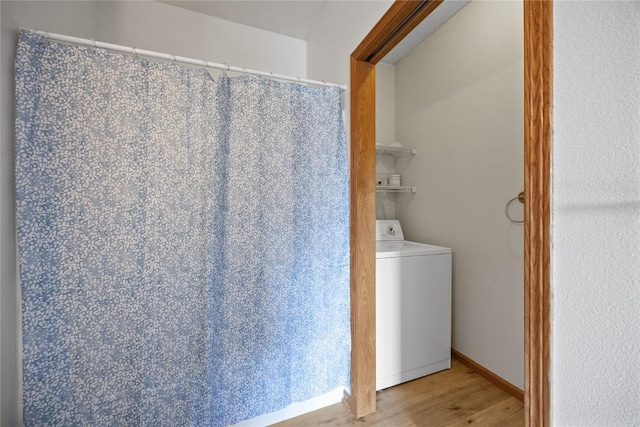 250 Cimarron Dr NE, Hiawatha, IA 52233 - washroom with washer / clothes dryer and wood finished floors