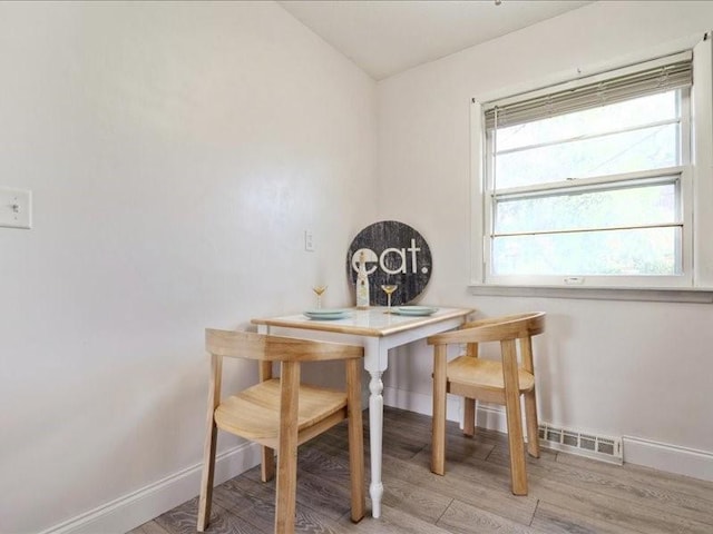 8 25th Ave SW, Cedar Rapids, IA 52404 - dining room with baseboards and light wood-style floors