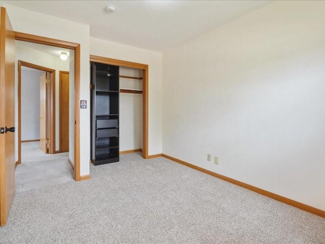 8 25th Ave SW, Cedar Rapids, IA 52404 - unfurnished bedroom with light carpet and a closet