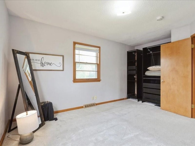 8 25th Ave SW, Cedar Rapids, IA 52404 - unfurnished bedroom featuring carpet floors and baseboards