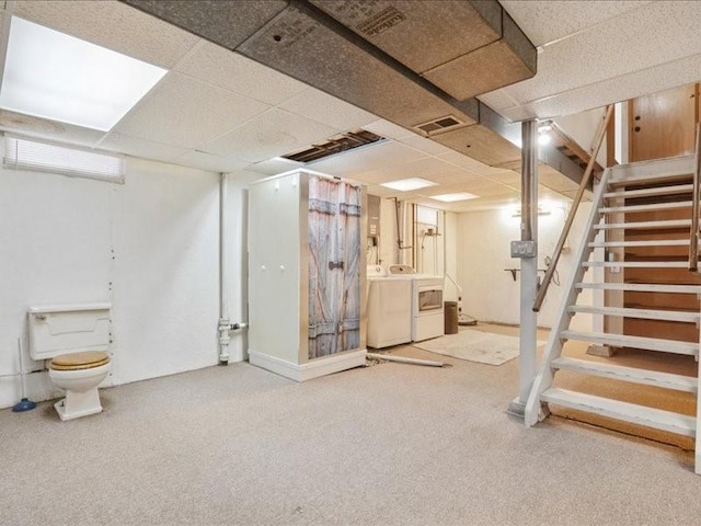 8 25th Ave SW, Cedar Rapids, IA 52404 - finished basement with washer and clothes dryer, stairs, carpet floors, and a drop ceiling