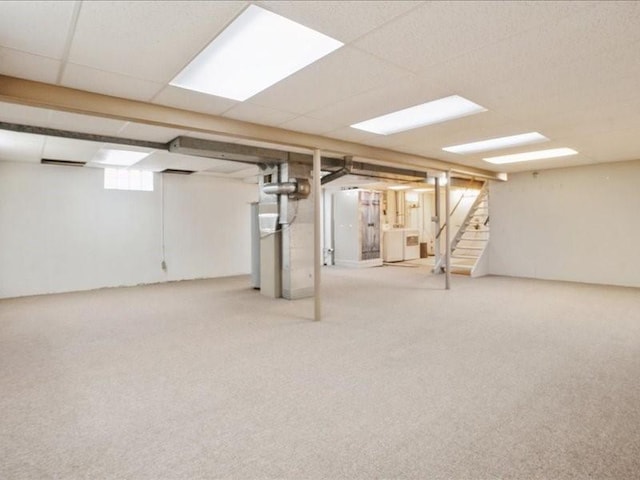 8 25th Ave SW, Cedar Rapids, IA 52404 - basement with independent washer and dryer, carpet flooring, and stairway