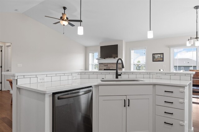 4263 Calder Dr, Marion, IA 52302 - kitchen featuring dishwasher, open floor plan, lofted ceiling, light countertops, and ceiling fan