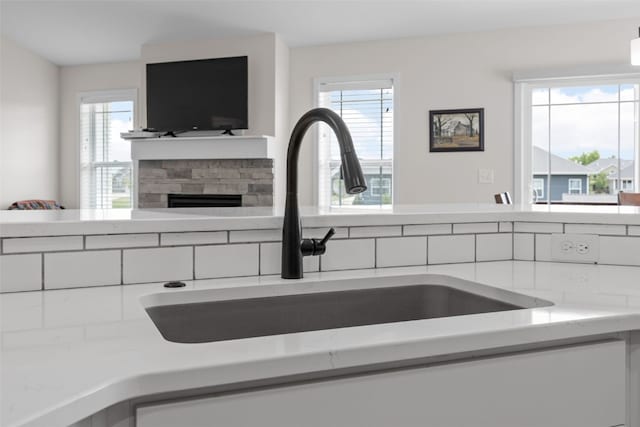 4263 Calder Dr, Marion, IA 52302 - detailed view of a sink and a stone fireplace