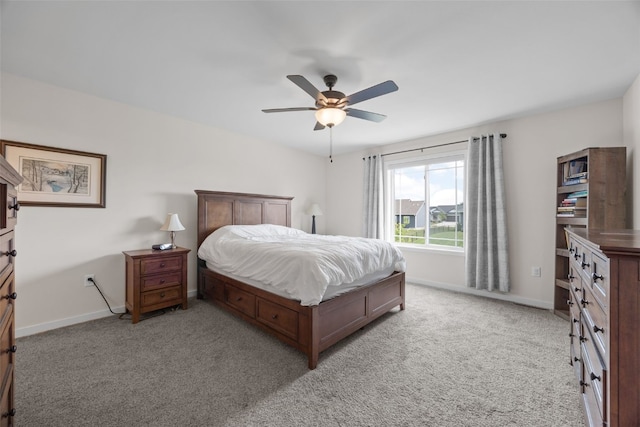 4263 Calder Dr, Marion, IA 52302 - bedroom with light carpet and a ceiling fan