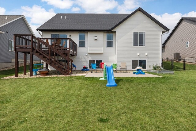 4263 Calder Dr, Marion, IA 52302 - rear view of property featuring a wooden deck, a patio, stairs, and roof with shingles