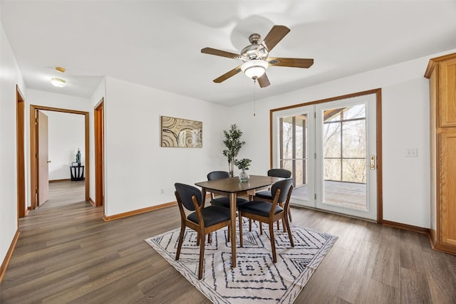 13294 212th Ave, Anamosa, IA 52205 - dining space with dark wood-style flooring and a ceiling fan