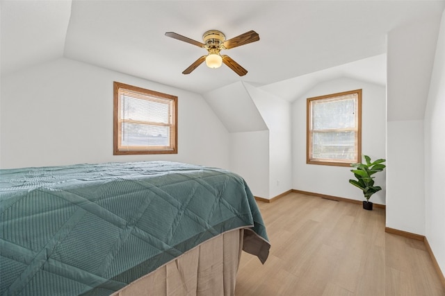 13294 212th Ave, Anamosa, IA 52205 - bedroom featuring lofted ceiling, light wood finished floors, and a ceiling fan