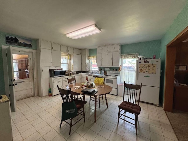 3367 Frost Ave, Brandon, IA 52210 - dining room featuring plenty of natural light and light tile patterned floors
