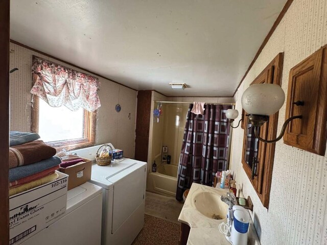 3367 Frost Ave, Brandon, IA 52210 - washroom with washing machine and clothes dryer and wallpapered walls