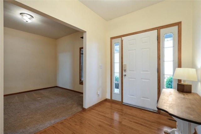 765 34th Ave, Marion, IA 52302 - foyer featuring healthy amount of natural light and wood finished floors