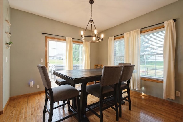 765 34th Ave, Marion, IA 52302 - dining room with a chandelier and wood finished floors