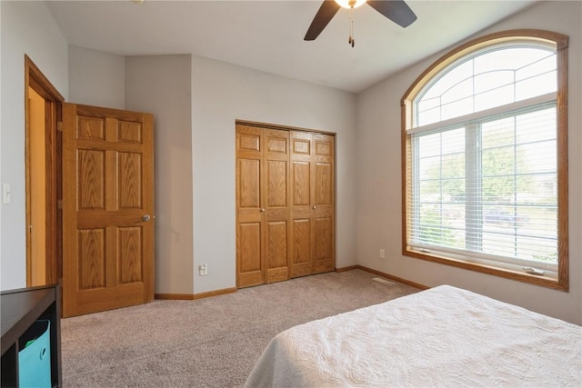 765 34th Ave, Marion, IA 52302 - carpeted bedroom featuring a closet and a ceiling fan