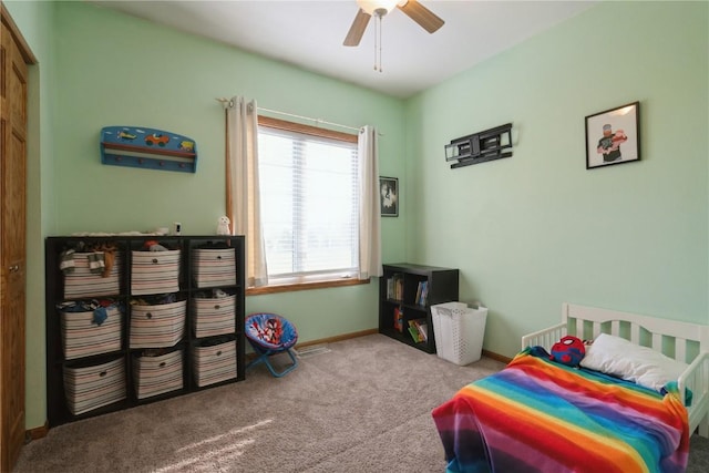 765 34th Ave, Marion, IA 52302 - carpeted bedroom featuring ceiling fan and baseboards