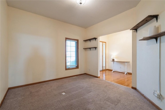 765 34th Ave, Marion, IA 52302 - carpeted empty room featuring baseboards