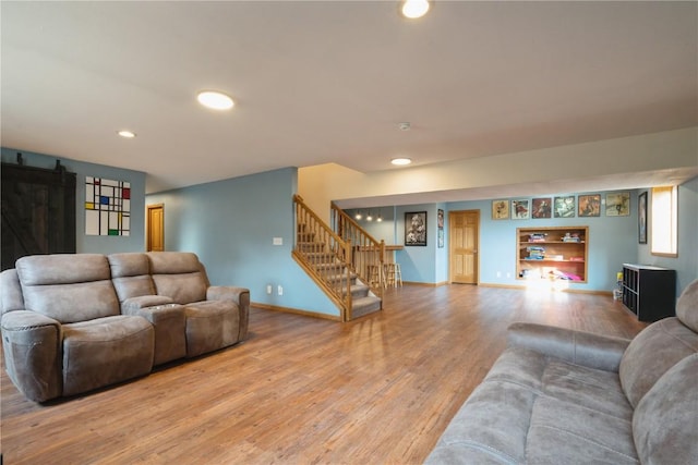 765 34th Ave, Marion, IA 52302 - living area featuring stairs, light wood-style floors, and recessed lighting