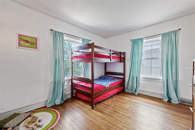 1812 Blake Blvd SE, Cedar Rapids, IA 52403 - bedroom featuring hardwood / wood-style flooring and baseboards