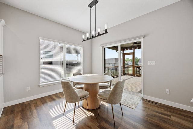 6415 Rookwood Ln, Marion, IA 52302 - dining area featuring wood finished floors and a chandelier
