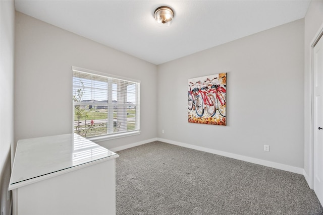 6415 Rookwood Ln, Marion, IA 52302 - carpeted spare room featuring baseboards