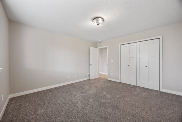 6415 Rookwood Ln, Marion, IA 52302 - unfurnished bedroom featuring carpet flooring and a closet