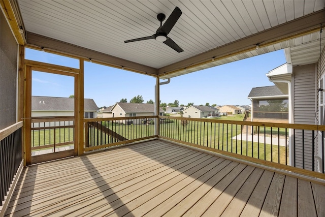 6415 Rookwood Ln, Marion, IA 52302 - wooden terrace featuring a residential view, a sunroom, ceiling fan, and a lawn