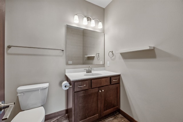450 2nd St, Fairfax, IA 52228 - bathroom featuring toilet and vanity