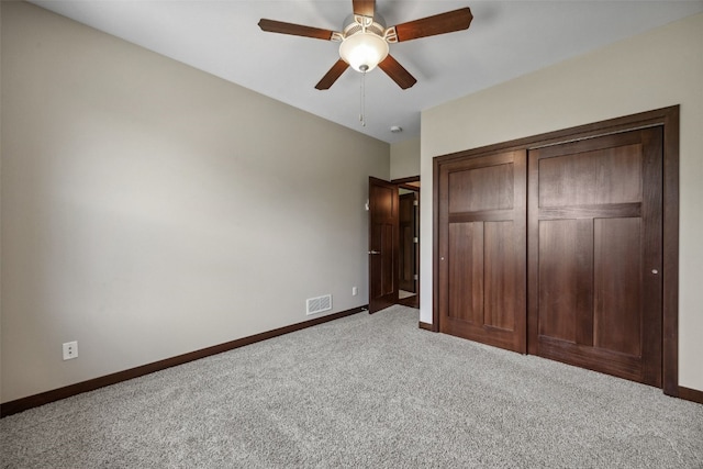 450 2nd St, Fairfax, IA 52228 - unfurnished bedroom featuring carpet floors, a closet, and ceiling fan