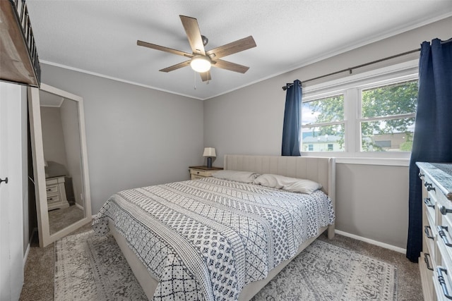 6234 Eastview Ave SW, Cedar Rapids, IA 52404 - carpeted bedroom featuring ornamental molding and a ceiling fan
