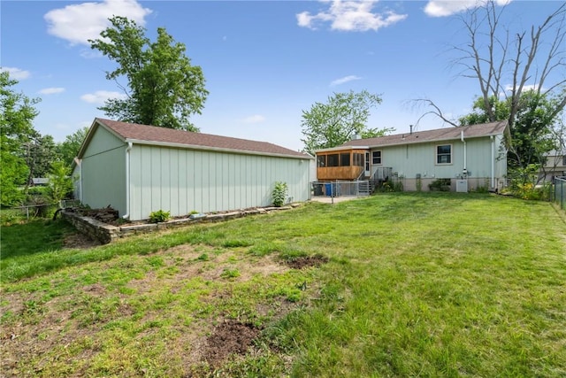 4531 Sugar Pine Dr NE, Cedar Rapids, IA 52402 - fenced backyard with a sunroom