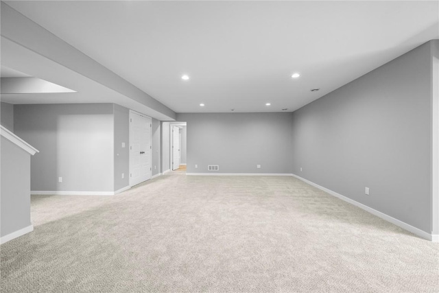 5007 Dostal Dr, Cedar Rapids, IA 52404 - finished basement with light carpet and recessed lighting