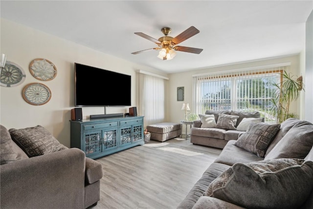 5515 Cedar Dr NW, Cedar Rapids, IA 52405 - living area with a ceiling fan and wood finished floors