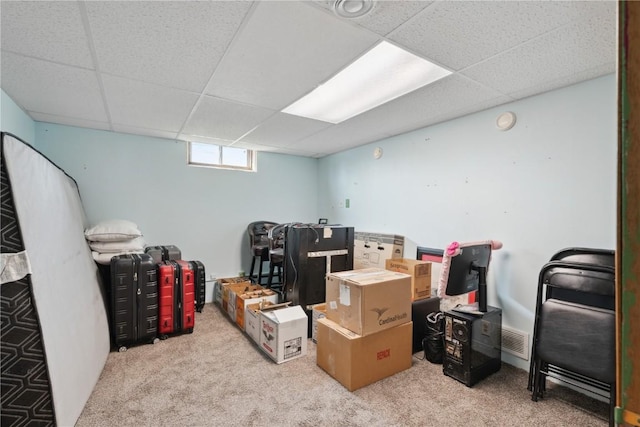 5515 Cedar Dr NW, Cedar Rapids, IA 52405 - basement featuring a drop ceiling and carpet