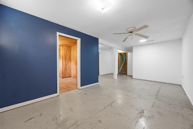 2030 26th St, Marion, IA 52302 - unfurnished room with stairway, a ceiling fan, and finished concrete floors