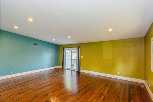 1346 11th St, Marion, IA 52302 - empty room featuring wood finished floors and recessed lighting