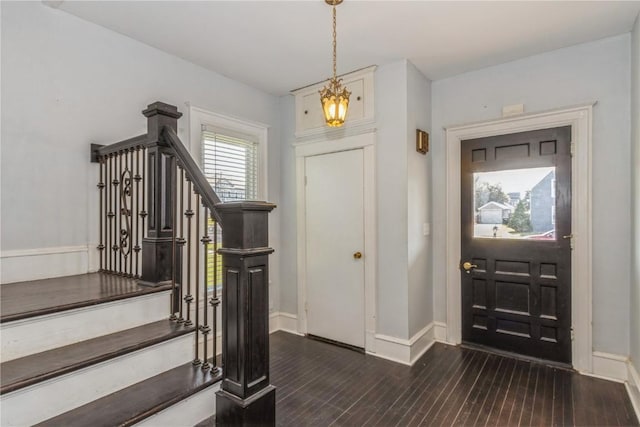 1346 11th St, Marion, IA 52302 - foyer with stairway and dark wood-style flooring