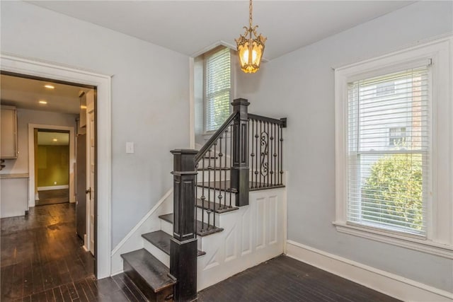 1346 11th St, Marion, IA 52302 - staircase with plenty of natural light and wood finished floors