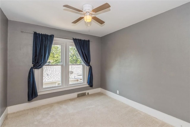 1346 11th St, Marion, IA 52302 - unfurnished room featuring carpet and ceiling fan