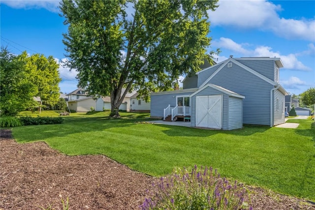 1346 11th St, Marion, IA 52302 - view of green lawn with a shed