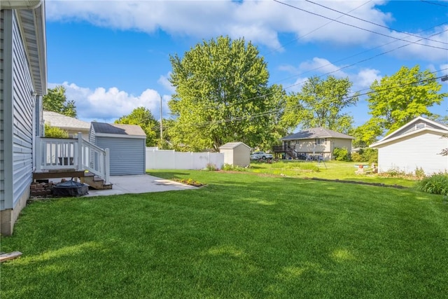 1346 11th St, Marion, IA 52302 - view of yard with a storage unit and a patio area