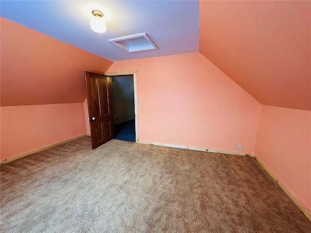 109 Pine St NW, Blairstown, IA 52209 - additional living space with carpet floors and lofted ceiling