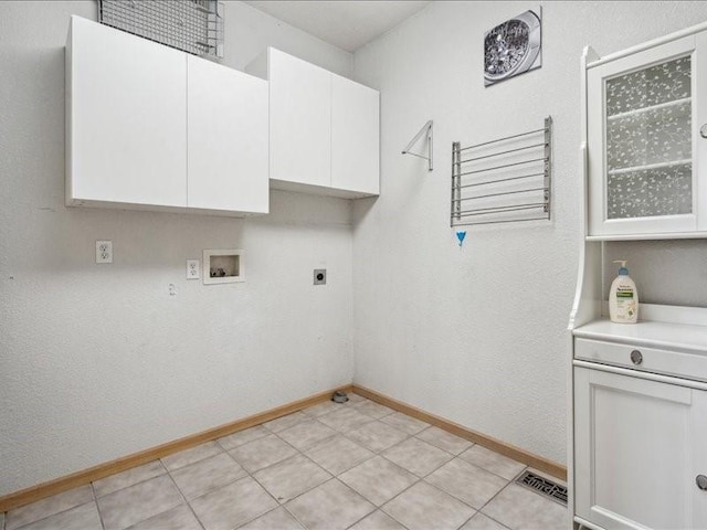 3387 64th St, Palo, IA 52324 - laundry area with hookup for a washing machine, hookup for an electric dryer, and cabinet space