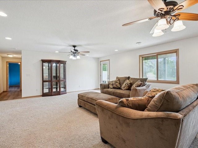 3387 64th St, Palo, IA 52324 - living area featuring carpet, healthy amount of natural light, ceiling fan, and recessed lighting