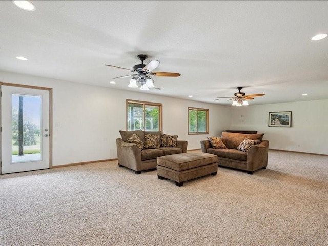 3387 64th St, Palo, IA 52324 - living area with light carpet, ceiling fan, and recessed lighting