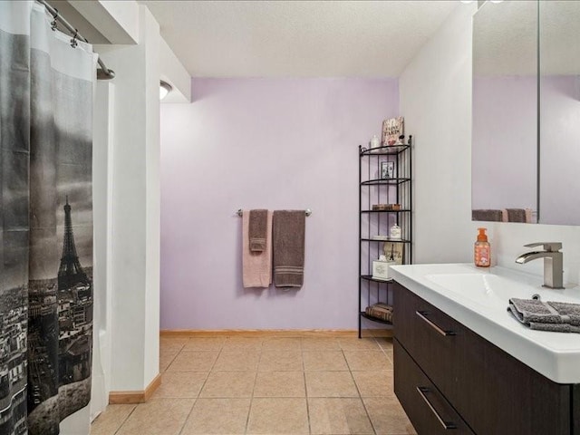 3387 64th St, Palo, IA 52324 - bathroom featuring vanity, tile patterned flooring, and curtained shower