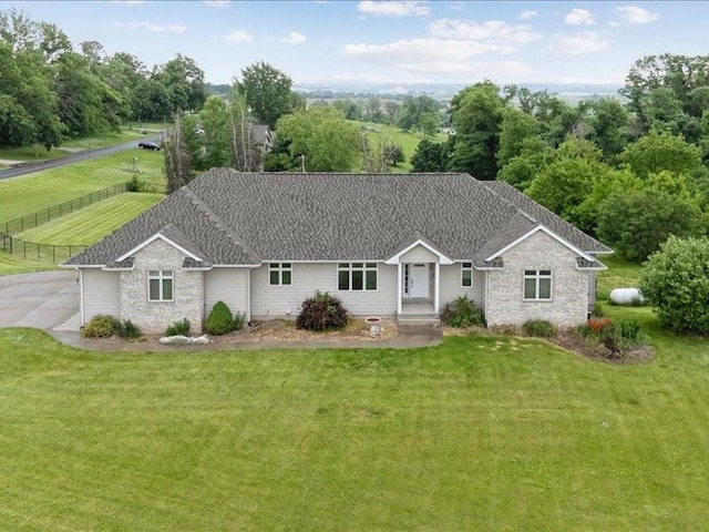 3387 64th St, Palo, IA 52324 - ranch-style home with a front yard and brick siding