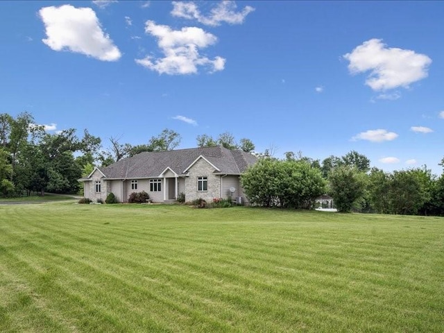 3387 64th St, Palo, IA 52324 - single story home featuring a front yard
