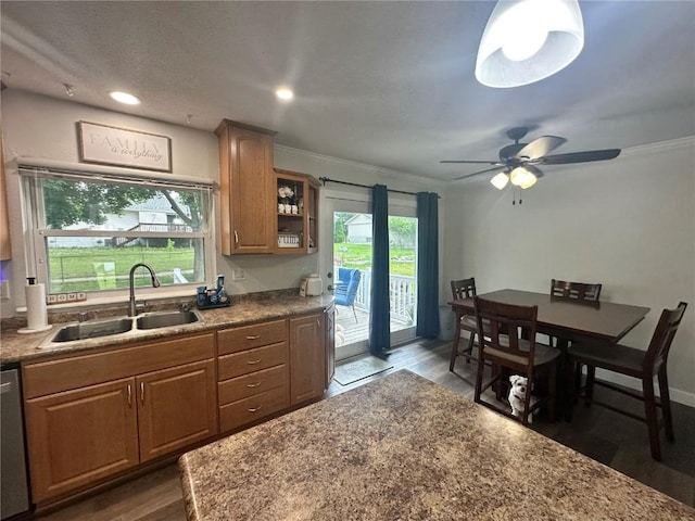 6706 Boxwood Ln NE, Cedar Rapids, IA 52402 - kitchen featuring dark wood-style floors, ornamental molding, ceiling fan, brown cabinets, and recessed lighting