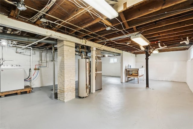 1612 Greene Ave NE, Cedar Rapids, IA 52402 - below grade area with washer / dryer, water heater, and concrete block wall